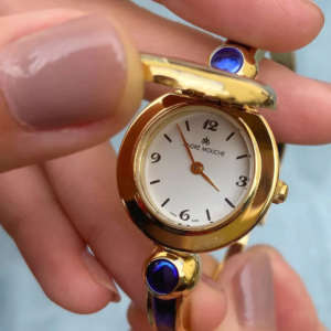 andré mouche alambra quarz gold blau 25mm edelstahl